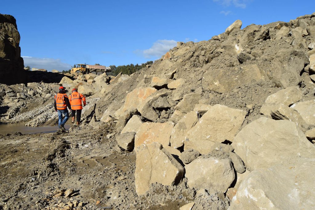 workers examine quarry